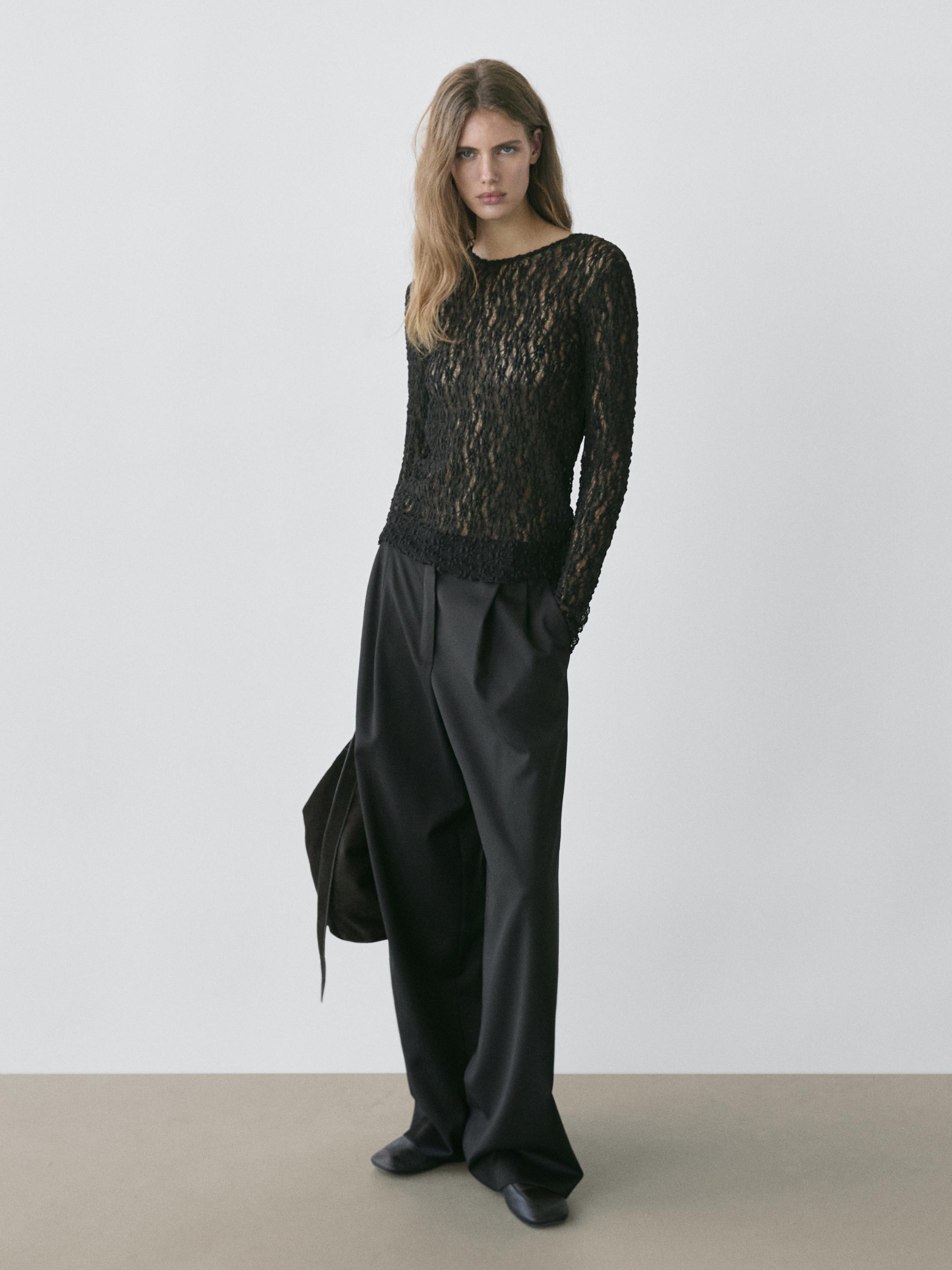 Openwork knit top with long sleeves and lace